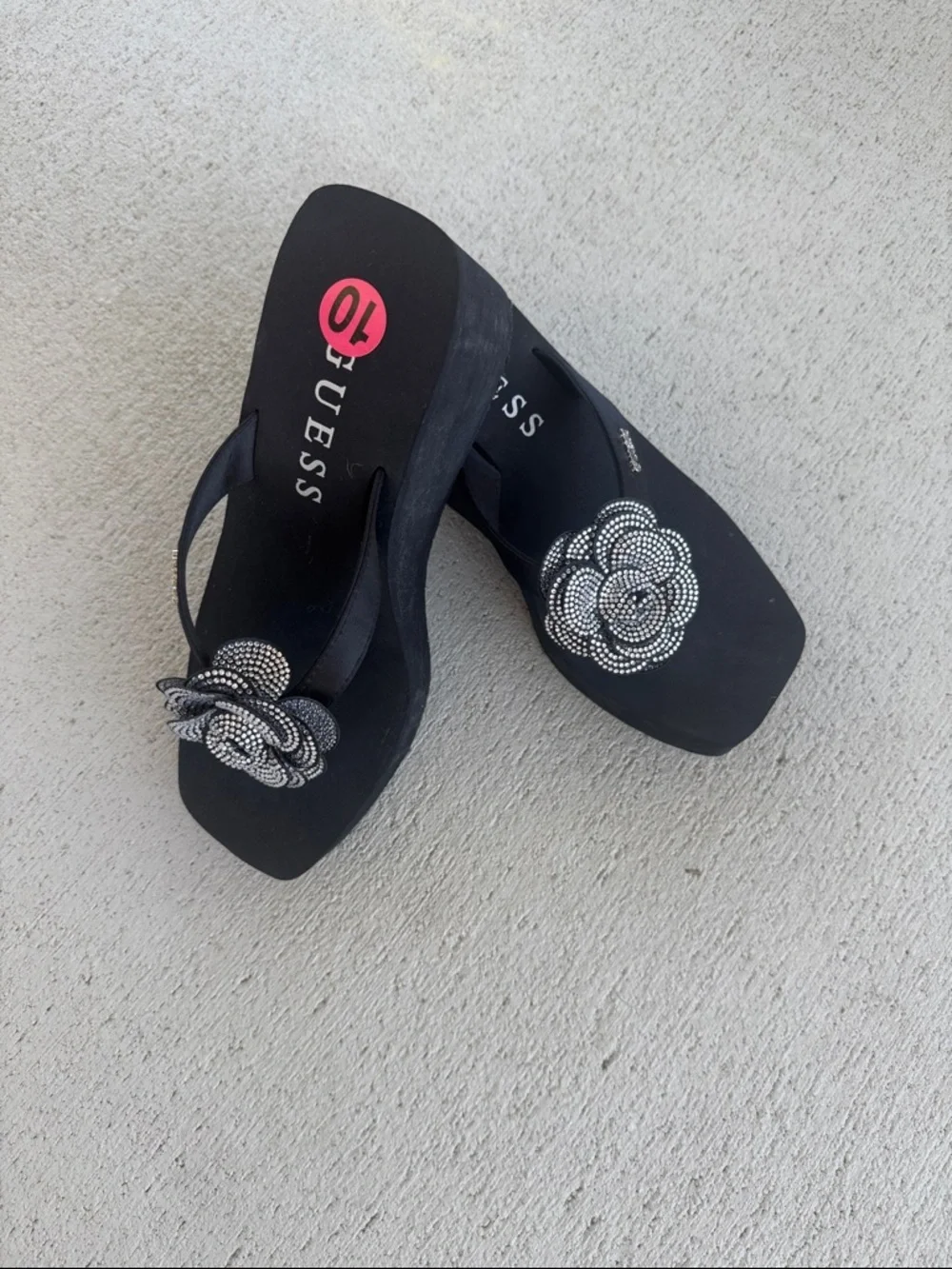 GUESS Black Wedge Sandal with Crystal Flower Accent